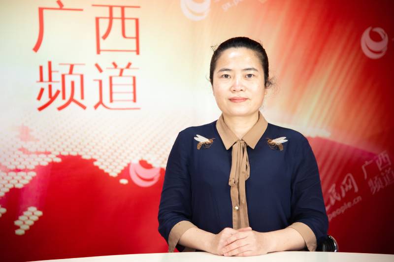 田林县妇联主席黄秀琴接受人民网专访。严立政摄
